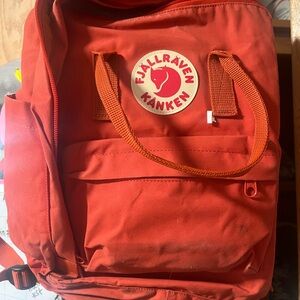 Reddish/orange small backpack